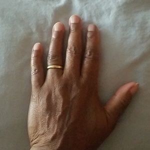 Tiffany & Co 18K yellow gold Lucida band.